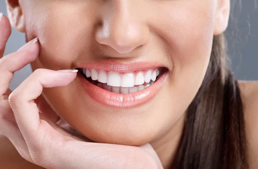 a closeup woman's smile